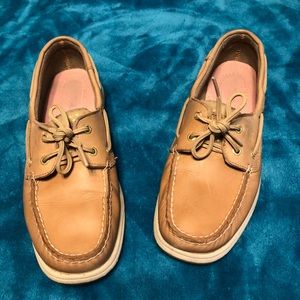 Tan colored Sperrys.